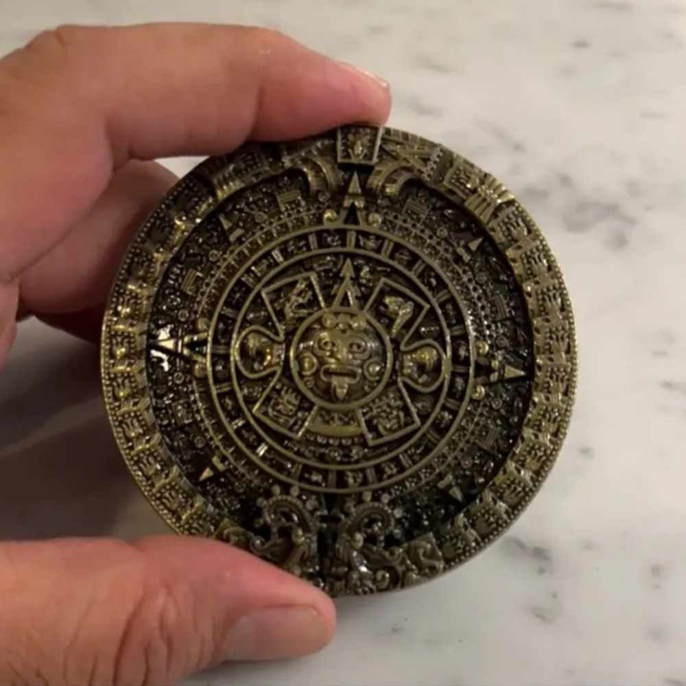 New Aztec calendar belt buckle approximately 3.5".   Message me with your choice